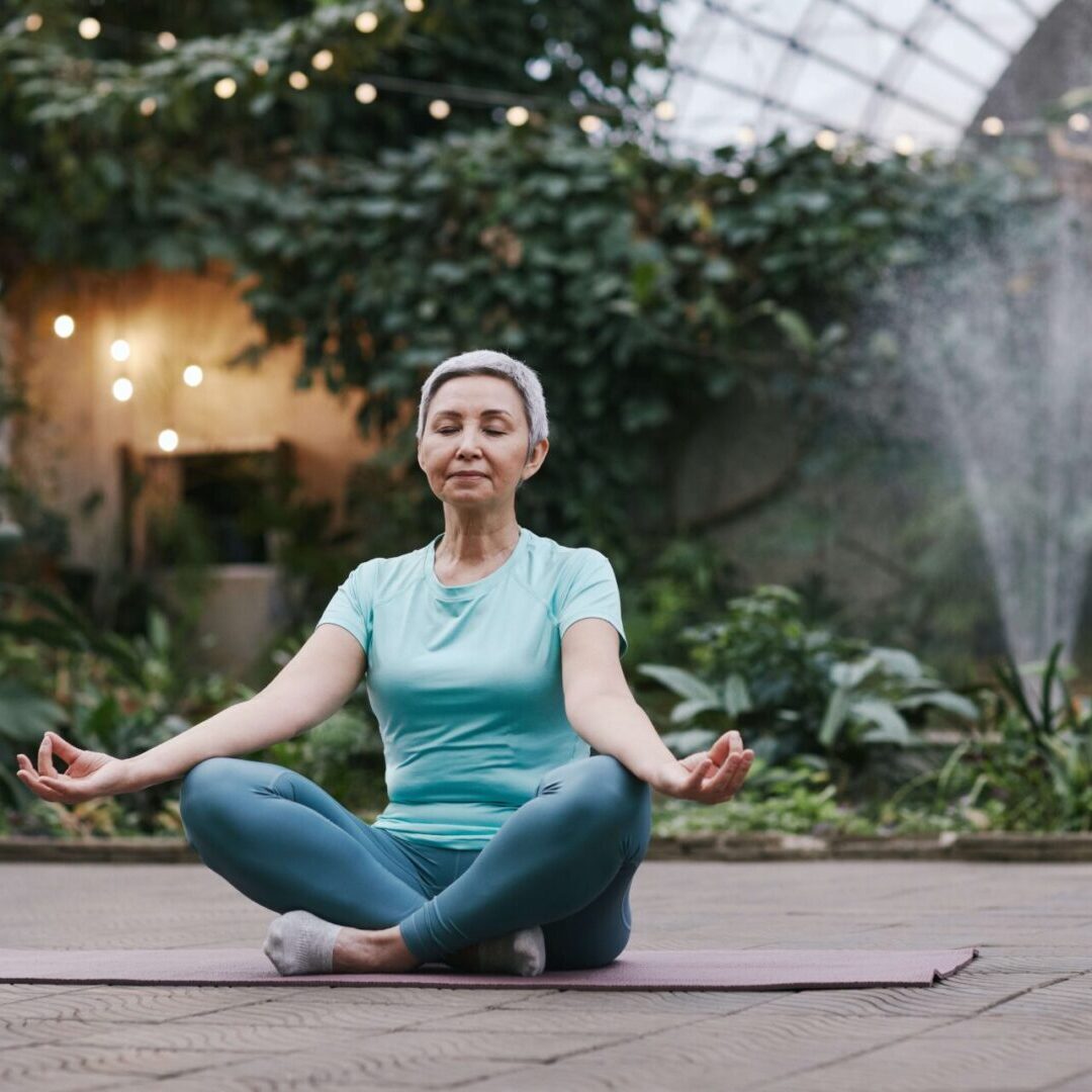 An old women doing a yoga